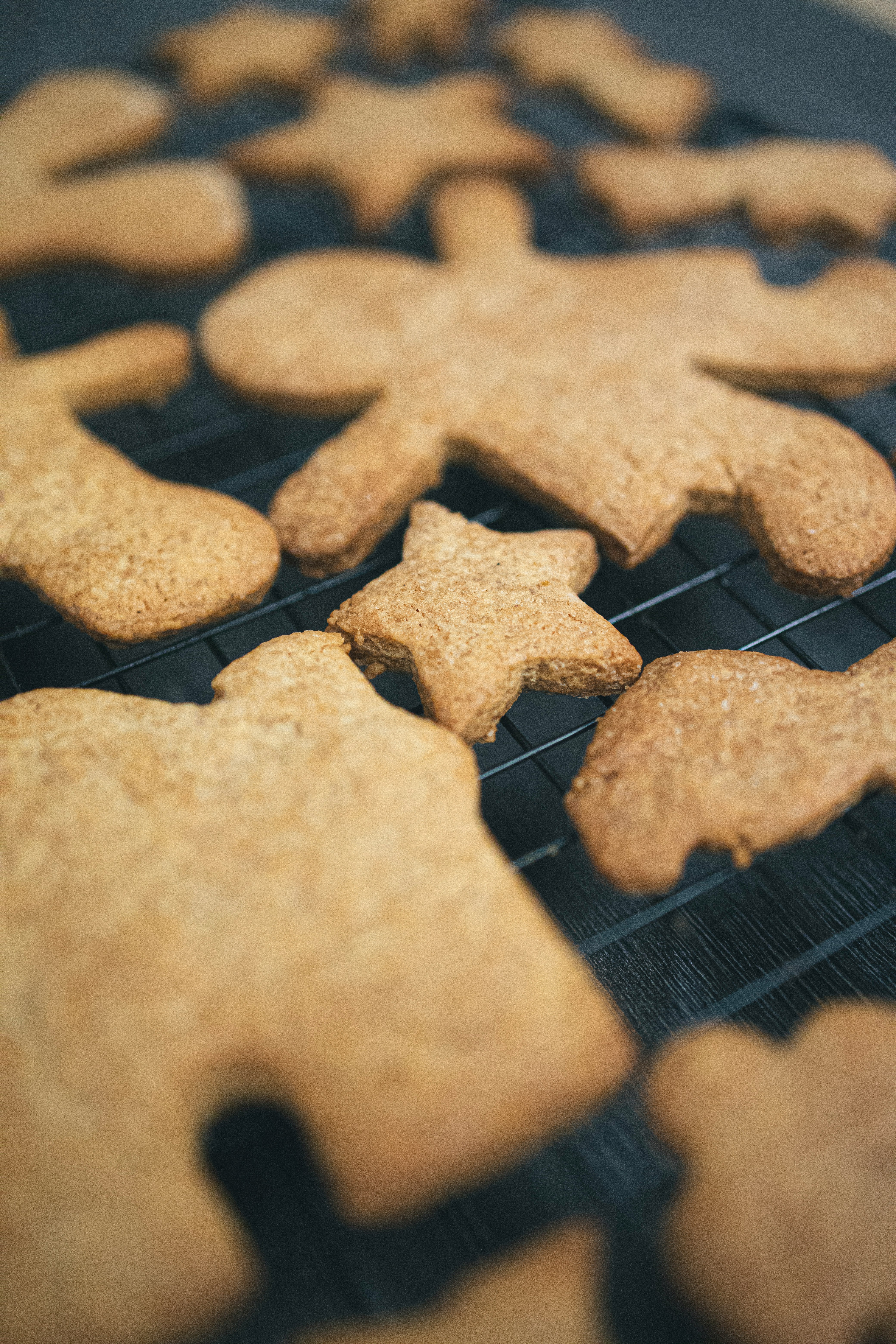 brown cookies on black metal grill